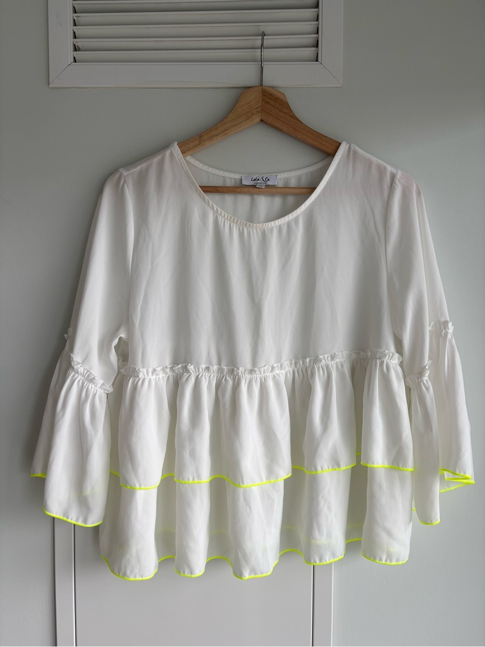 White Ruffle Peplum Top with Neon Trim